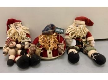 Three Plush Christmas Santa Decorations