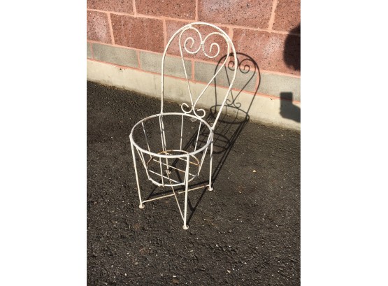 Cute Garden Planter Styled As An Antique Iron Patio Chair