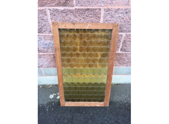 Antique Yellow Glass Window With Circular Design In Wood Frame