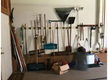 Garage Wall Of Tools, Ropes, Shovels Etc.