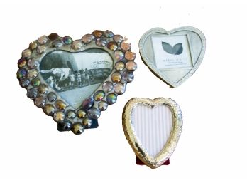 A Grouping Of Heart Picture Frames With One Diane Markin ($100)