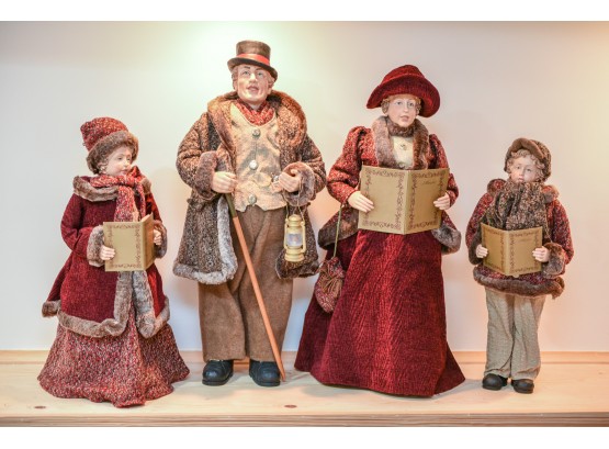 Four Christmas Caroler Dolls