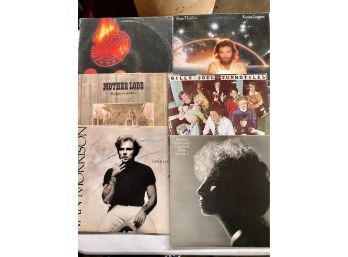 A Group Of 6 Records Mostly From The 70's
