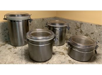 Four Stainless Canisters