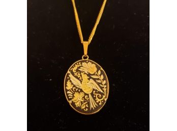 Navy And Gold Tone Bird Pendant Necklace