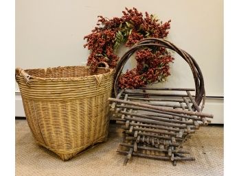 A Wicker Anda  Twigg Basket Along With A Decorative Wreath