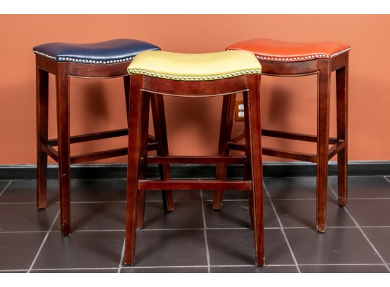 Set Of Three Colorful Simulated Leather Stools