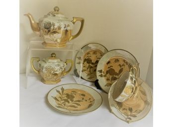 JAPAN- 9 Lusterware Pieces-Teapot, Covered Sugar Bowl, 3 Salad Plates, 1 Cup & Saucer