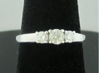 Three Stone Diamond Engagement Ring