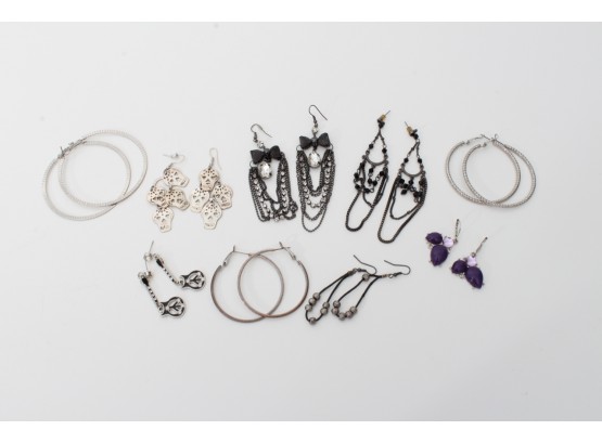 Nine Pairs Of Silver Tone Fashion Earrings