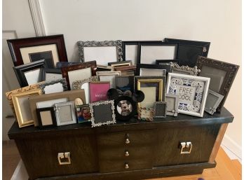Geoup Of Thirty-Six Table Top Picture Frames