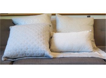 Collection Of Grey Decorative Pillows And Shams