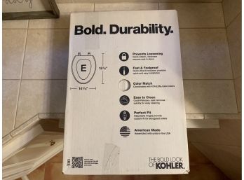 New-in-box Kohler White Elongated Toilet Seat