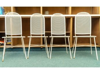 Set Of Four White Metal Mesh Chairs