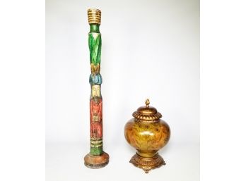 A Primitive Carved Candlestick And Decorative Urn Pairing