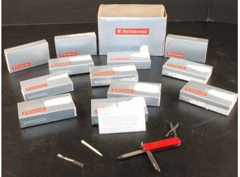 A Dozen New Victorinox Swiss Army Mini Multi-tools Classic Red Pocket Knives