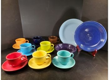 Large Assortment Of Genuine Multi Colored  Fiestaware Dishes, Cups, Saucers, Bowls