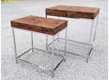 A Pair Of Modern Chrome And Animal Hide Accent Tables