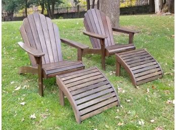 A Pair Of Teak Adirondak Chairs And Lounger Footrests