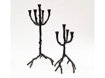 A Pair Of Cast Iron Candelabra