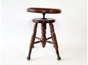 An Antique Piano Stool
