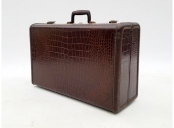 A Vintage Samsonite Leather Suitcase