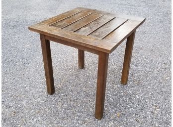 A Varnished Teak Outdoor End Table