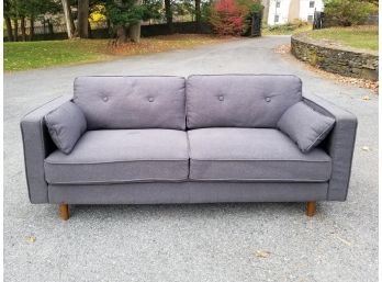 A Modern Linen Upholstered Sofa