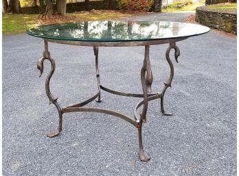 A Custom Wrought Iron Glass Top Table With Swan Motif