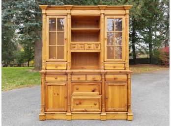 A Lighted Pine China Cabinet By Broyhill Furniture
