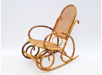 A Vintage Bamboo And Cane Rocking Chair