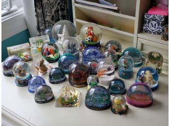 Cute Assortment Of Mostly Holiday & Travel Snow Globes