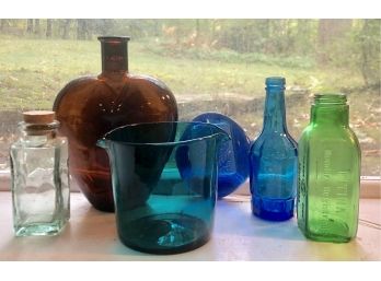 Lot Of Colorful Glass Bottles