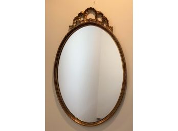 Beautiful Oval Mirror In A Gilt Frame, Ribbon Top.