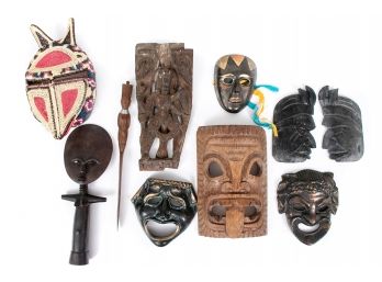 Collection Of Tribal Masks And Oddities