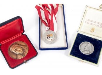 Three Medals/coins In Cases