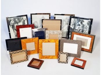 A Large Assortment Of Photo Frames