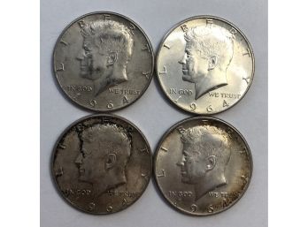 Four 1964 Kennedy Half Dollars