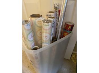 Large Assortment Of Gift Wrap And Plastic Storage.  Mostly Baby Wrap.