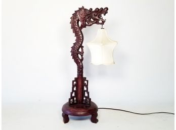 A Rare Carved Wood Chinoserie Dragon Lamp