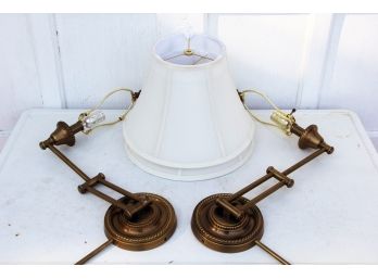 A Pair Of Brass Wall Sconces
