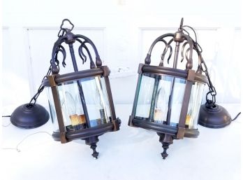 A Pair Of Oil Rubbed Bronze Pendant Lanterns