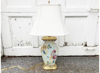 A Brass And Ceramic Accent Lamp