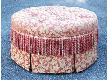 A Round Upholstered Ottoman