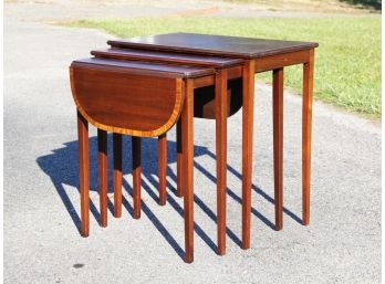 A Set Of Vintage Inlaid Mahogany Nesting Tables By Ferguson Furniture
