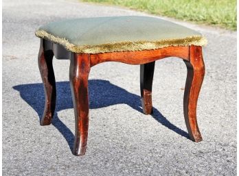 An Upholstered Footstool