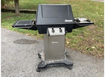 A Ducane Propane Grill With Side Burner