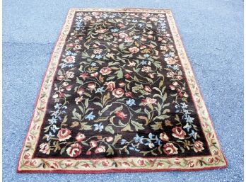 A Wool Area Rug In Floral Pattern
