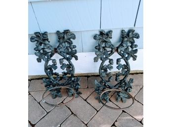 A Pair Of Ornate Wrought Iron Hanging Planter Stands