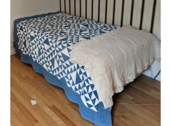 Crocheted Throw And Blue And White Quilt